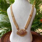Traditional 3-Strand Pearl Hara with Shanka Design CZ Ruby Pendant – South Indian Temple Jewelry Long Pearl Haar for Bridal & Festive Wear AH64