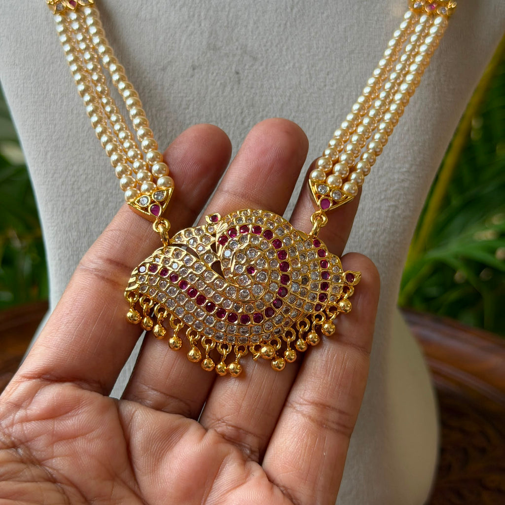 Traditional 3-Strand Pearl Hara with Shanka Design CZ Ruby Pendant – South Indian Temple Jewelry Long Pearl Haar for Bridal & Festive Wear AH64