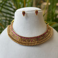 Antique Gold Finish Ruby Choker Necklace Set with Intricate Carving & Gold Bead Drops AN285