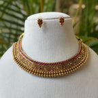 Antique Gold Finish Ruby Choker Necklace Set with Intricate Carving & Gold Bead Drops AN285