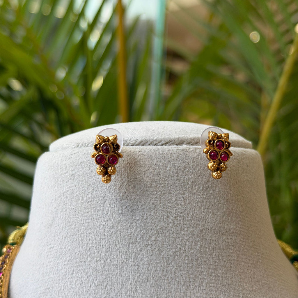 Antique Gold Finish Ruby Choker Necklace Set with Intricate Carving & Gold Bead Drops AN285