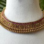 Antique Gold Finish Ruby Choker Necklace Set with Intricate Carving & Gold Bead Drops AN285