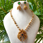 Antique Gold Finish Pearl & Bead Hara with Peacock Crescent Pendant – Traditional South Indian Temple Jewelry Set with Matching Jhumkas AN298