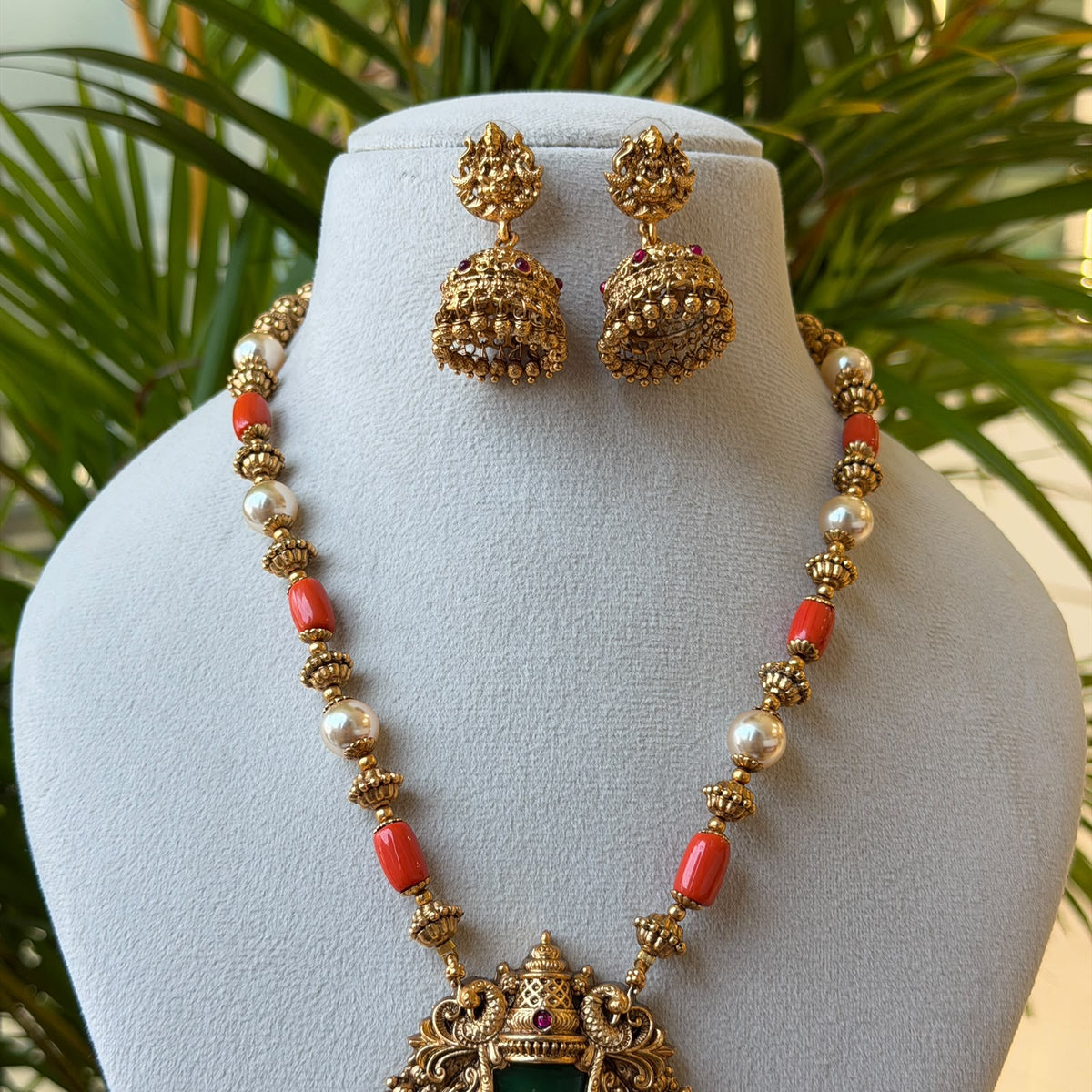 Antique Gold Lakshmi Temple Pendant Set – Coral & Pearl Bead Chain with Green Stone Goddess Pendant & Jhumka Earrings AN480