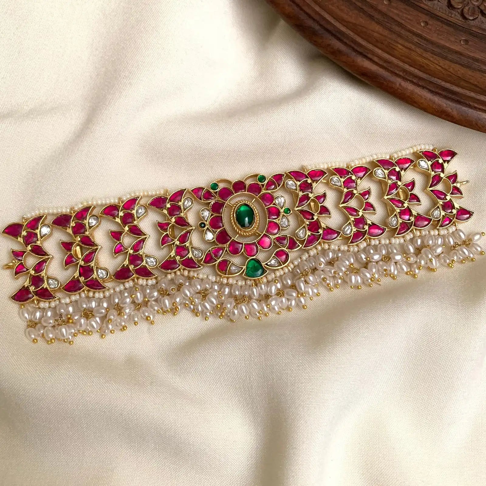 Elegant Three-Tiered Pearl Haram with Deep Emerald Teardrop Accents