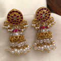 in this image there a perl earrings.